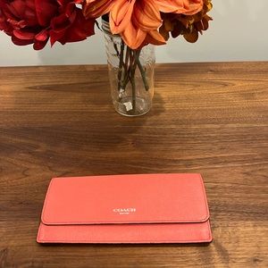 Streamlined and bright Coach Wallet